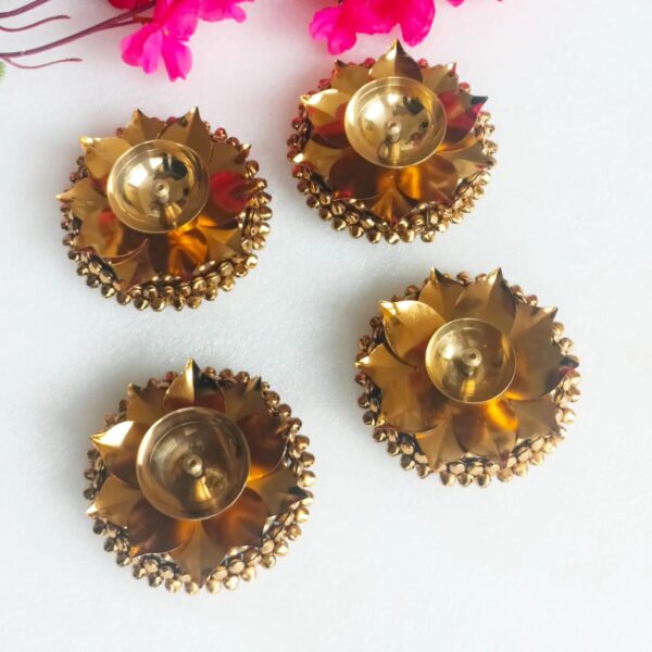 Lotus jyot diya Material: Metal Size -4 inch Moq -6 Pack in individual Perfect for return gifts Come with gift box packing individual