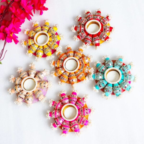 T-Light with Drum Decorated for Pooja/ Gifting Size -6 inch Base mdf Perfect for pooja or for return gifting purpose Decorated with pearl on sides