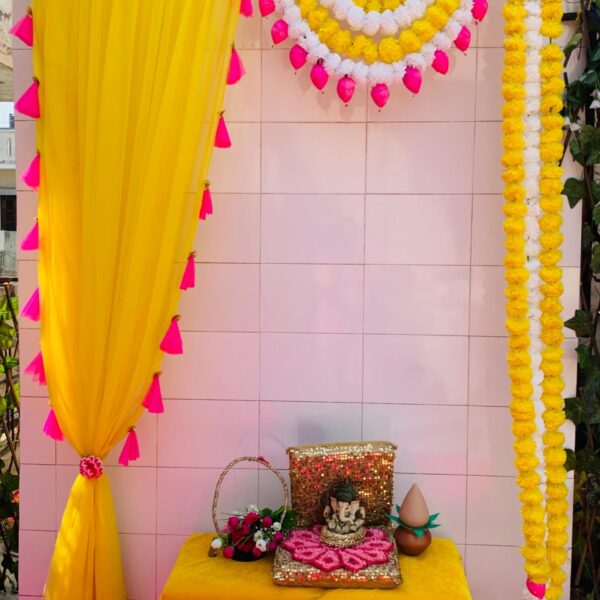 Marigold Lotus Curtain Backdrop Can be Used In any Festivals or Occasions Curtain Is Made up of Artificial Marigold Flowers, Lotus Buds, Tassels, Net Curtain (Beautifully Art Work Present By our Women Artisans from villages) Size- 7 feet length 5 feet width