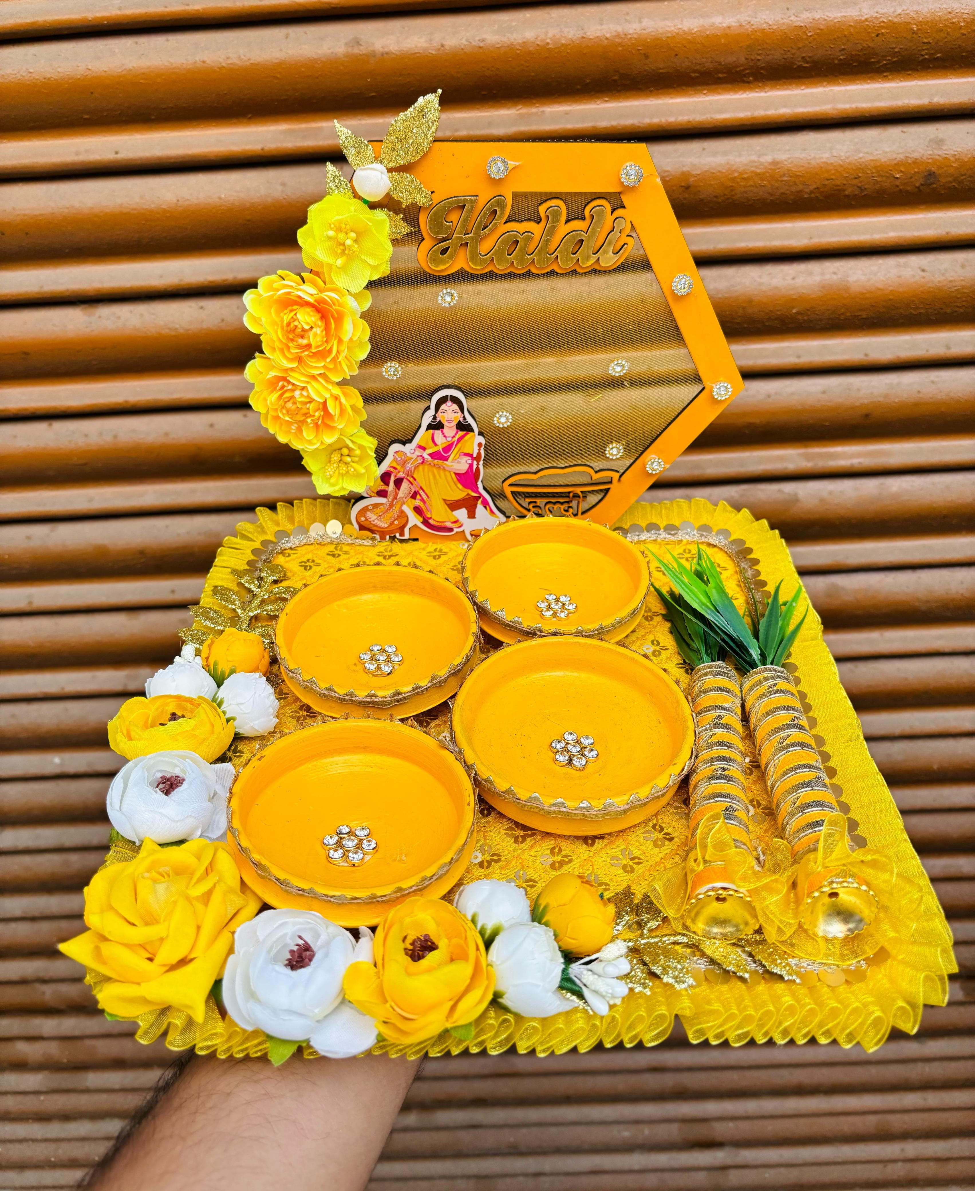 Haldi/Telbhaan Platter  Size 11 inch base MDF Set includes 2 Haldi sticks, 4 Terracotta bowls and a platter firmly packed in bubble wrap with 5 Ply Box to avoid damage in transit.