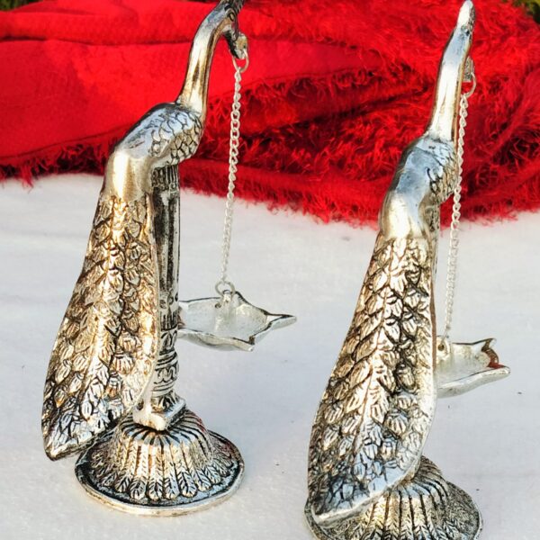 Antique German silver peacock diya pair