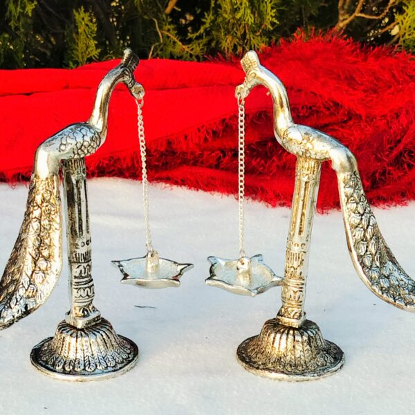 Antique German silver peacock diya pair