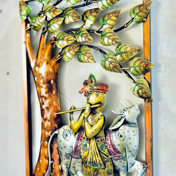 Metal Krishna with cow