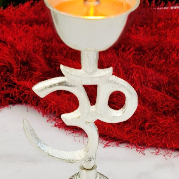 German silver Om design diya