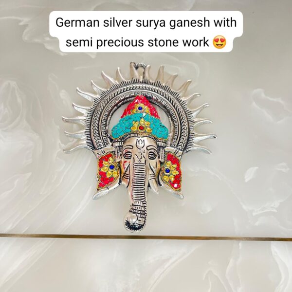 German silver surya ganesha with stone work