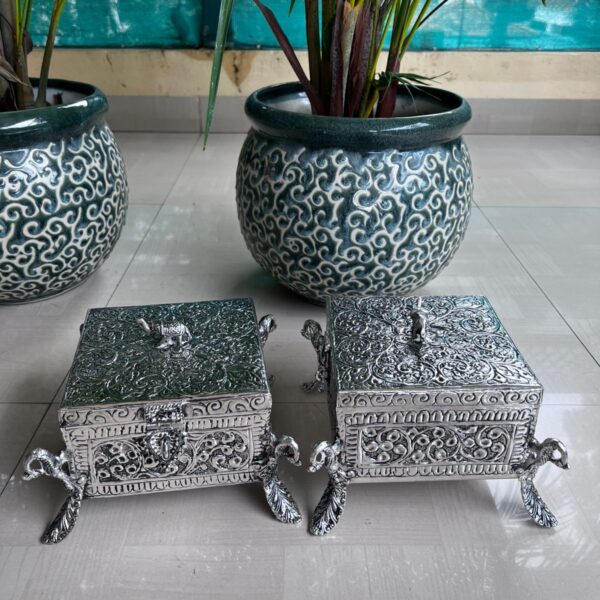 Square Diwali box with 4 peacocks and 1 small elephant on the lid