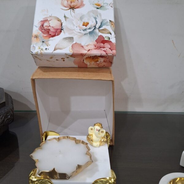 Small chawki with gold plated Ganesh and wax tlight