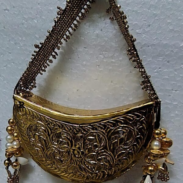 Hand carved golden plated Chand purse