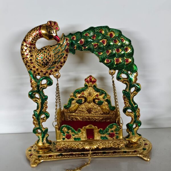 Metal jhula in peacock brass and gold