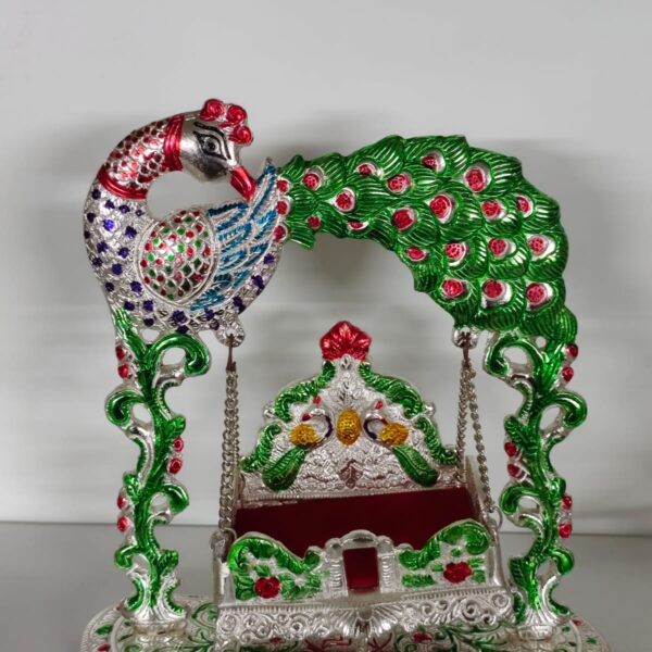Metal jhula in peacock brass and gold