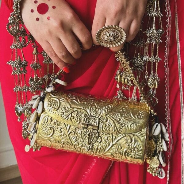 Hand carved German gold clutch