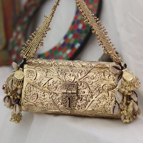 Hand carved German gold clutch