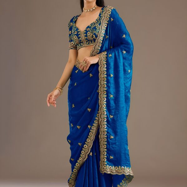 Royal blue saree with rich glossy shine and elegant drape