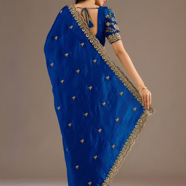 Royal blue saree with rich glossy shine and elegant drape